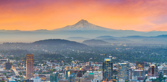 Portland Creative Staffing image of Skyline of Portland, Oregon, with Mt. Hood in the background. This is the home of Scion Portland Creative Staffing.