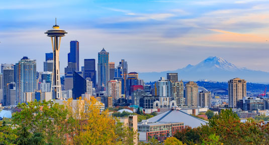 Seattle Creative Staffing image of Skyline of Seattle, Washington, with Mt. Rainier in the background. This is the home of Scion Seattle Creative Staffing