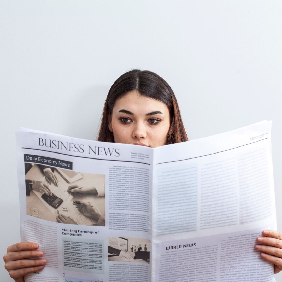How to Build Good Media Relations image of woman reading newspaper