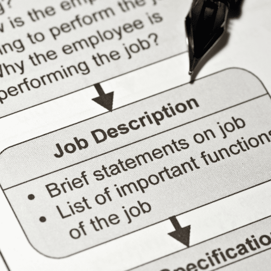 How to Write an Effective Job Description: Do's and Don'ts blog image of job description and pen