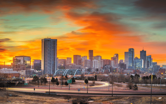 Scion Staffing Denver Recruiting Agency Skyline of Denver Colorado at Sunset